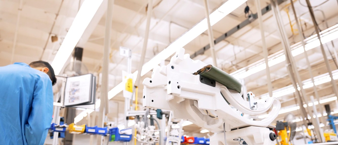 A-dec dental chair moving through the company's manufacturing operation