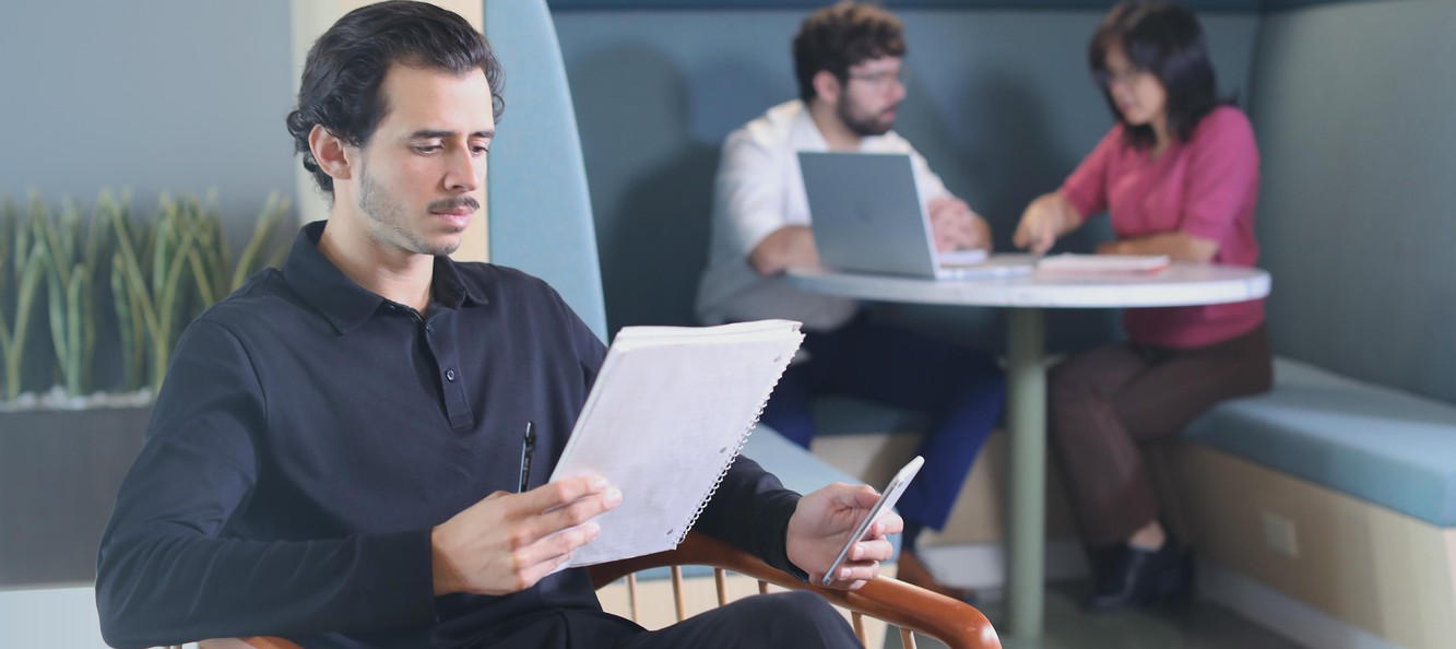 ADARx colleagues working in the company office