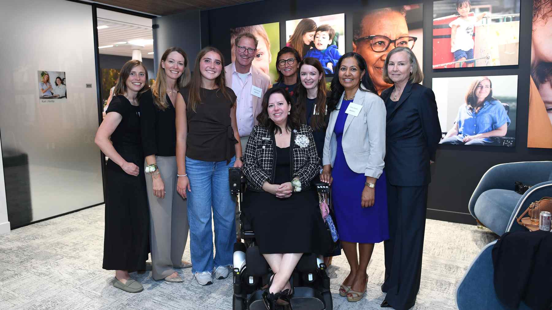 A smiling group of BridgeBio colleagues and patient advocates at the opening of its Washington, D.C. office