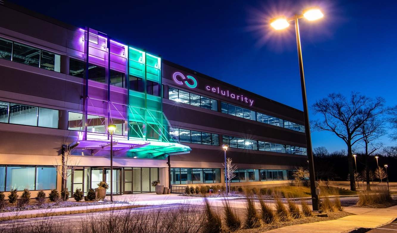 Celularity headquarters building illuminated at dusk
