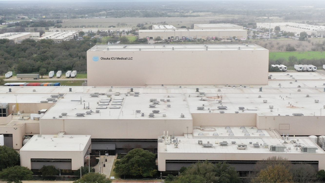 An aerial view of the Austin, Texas IV solutions plant run by the Otsuka ICU Medical joint venture, set among trees
