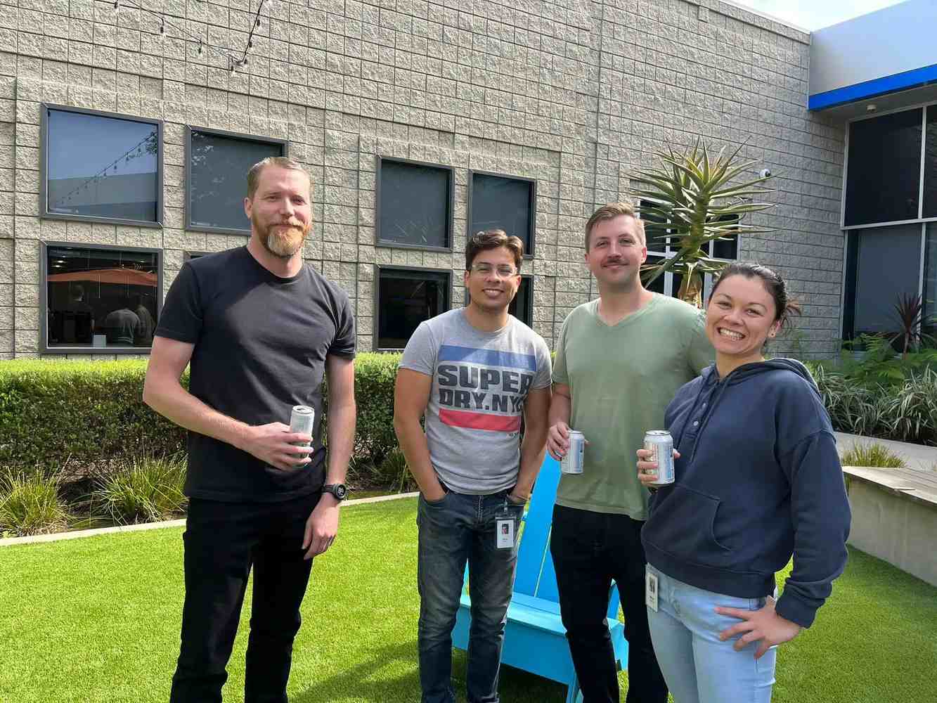 Invivoscribe colleagues standing together outside a company building
