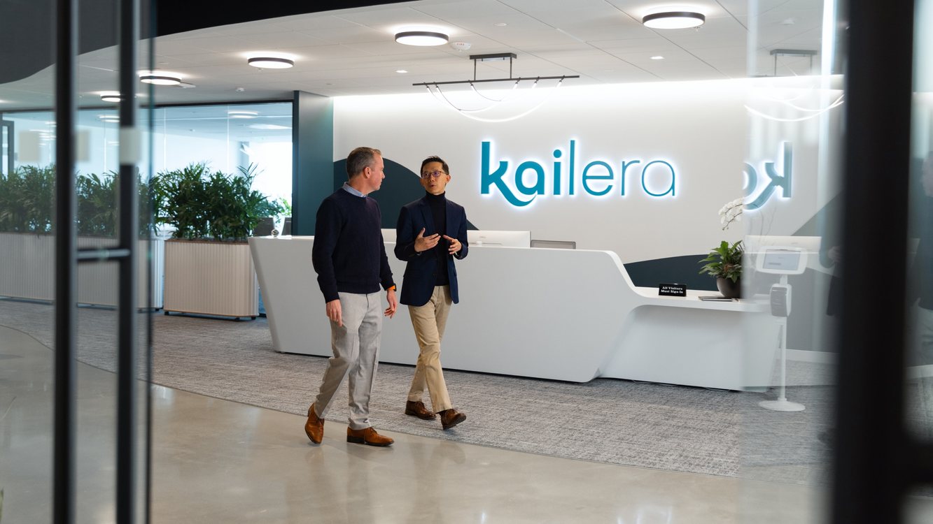 Kailera colleagues walking through the company reception area