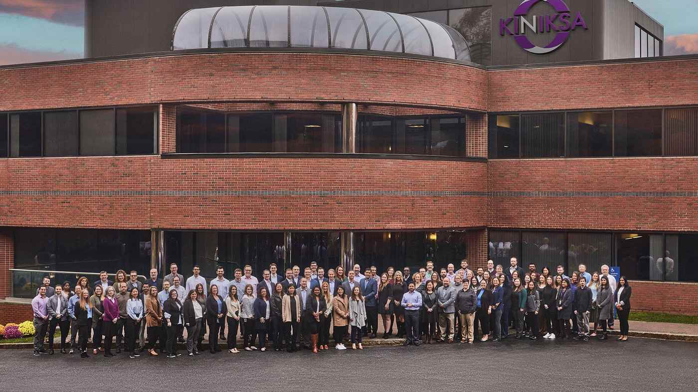 The Kiniksa team gathered outside its Lexington headquarters