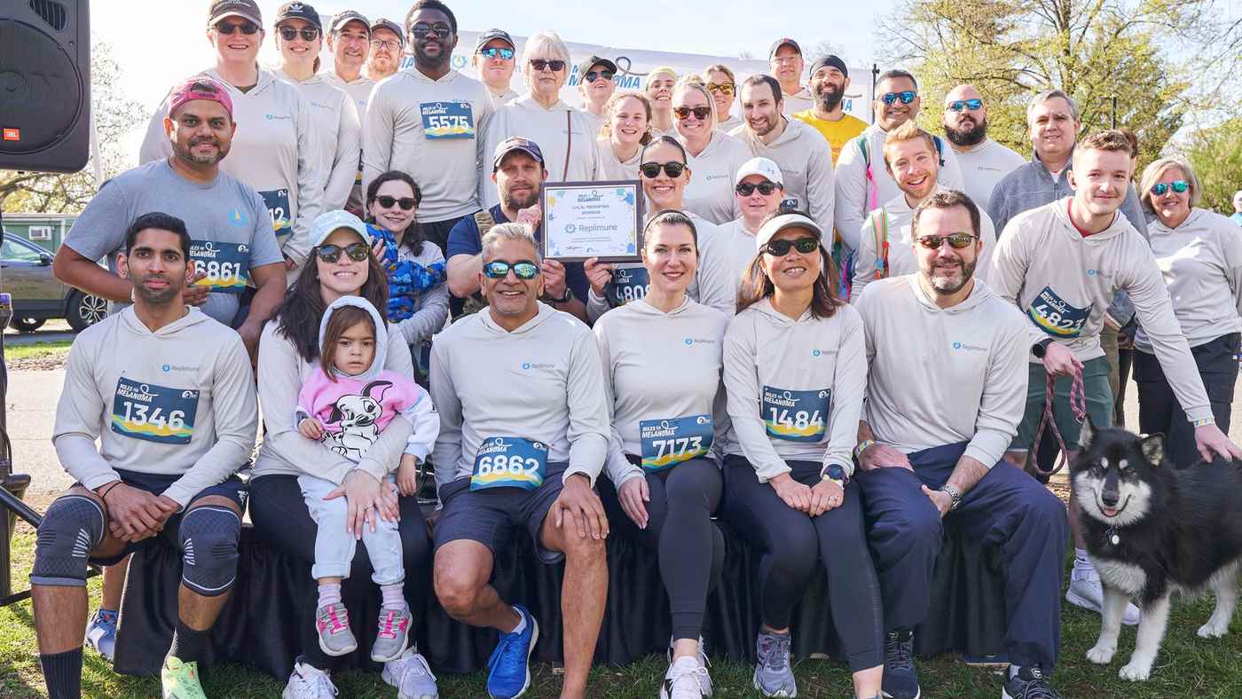 Replimune colleagues and families together at an outdoor community event